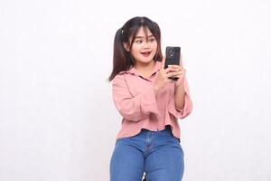 Business, finance and work Improvement projects successful Asian businessman cheerful professional stylish woman holding mobile phone shocked smile on white background photo