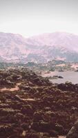 A stunning mountain range reflected in a serene lake video