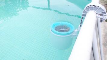 blue skimmer for cleaning the pool. Close-up of the skimmer mounted on a frame pool video