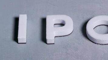 IPO initial public offering 3d letters close up light blue background video