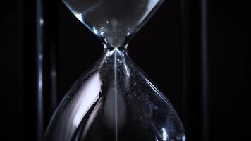 Hourglass white sand timer - Concept for time running out 5 video