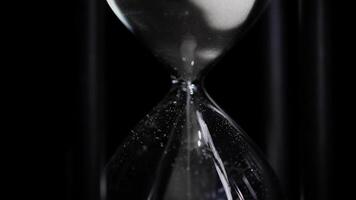 Hourglass white sand timer - Concept for time running out 3 video