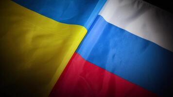 Dynamic turn of Ukraine and Russia national flags with vignette video