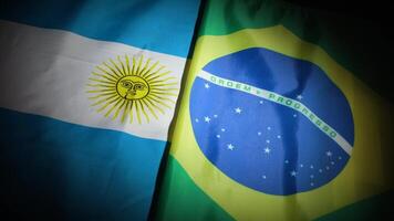 Dynamic turn of Argentina and Brazil national flags with vignette video