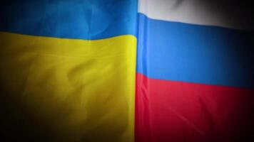 Rack focus of Ukraine and Russia national flags with vignette video