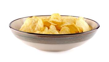 Bowl of potato chips isolated on white background. photo