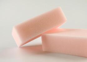 Melamine sponge on a light background. photo