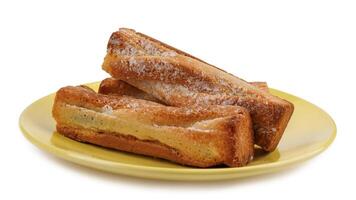 Several delicious crispy cookies lying on a yellow plate isolated on a white background. photo