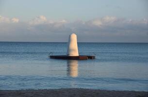 Gorgeous Scenic Views of a Swim Float in the Ocean photo