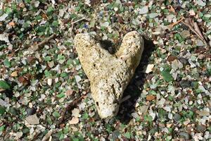 Heart Shaped Stone on a Sea Glass Beach photo