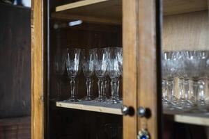 Antique glasses inside the cupboard 3 photo