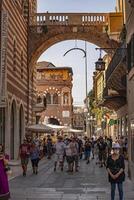 VERONA ITALY 10 SEPTEMBER 2020 Piazza dei Signori in Verona full of people photo