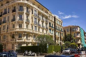 Nice France 20 august 2022 Baroque corner building in a central street of nice with very bright and mystical colors photo