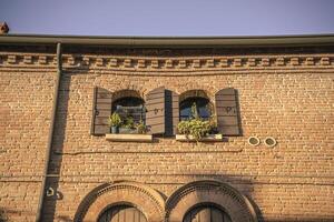 Medieval building detail facade windows photo