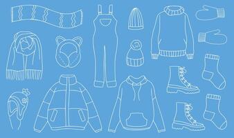 Warm autumn-winter clothes. collection of autumn-winter clothes. sketch icon isolated on blue. Seasonal design elements. . illustration vector