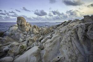 Granite rocky conformations on the Sardinian coast photo