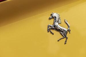 Vicenza Italy 19 March 2024 Close up shot of the iconic Ferrari Cavallino emblem symbolizing luxury and performance photo