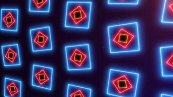 Abstract surface wall of glowing rotating multicolored shapes in space. Flow of blue red orange neon shiny square elements on a dark background with particles. 4k 60fps. video