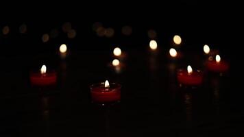 Many burning candles with shallow depth of field. Candle light. video