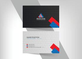 Business card template with red, blue and white triangles vector