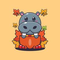 Cute hippo in a pumpkin at autumn season. vector