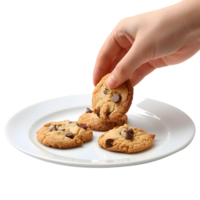 a hand picking up a cookie from a plate png