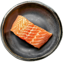 Fresh Salmon Fillet on a Black Ceramic Plate png