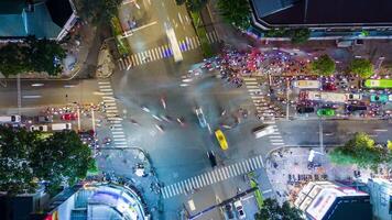 Aerial Timelapse of Evening Traffic at Intersection in Ho Chi Minh City, Vietnam video