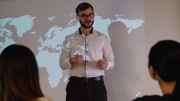 Group of new generation discussing about renewable energy at meeting room with world map on background. Global warming pollution greenhouse effect concept video