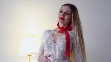 Portrait of blonde sexy woman at vintage studio video