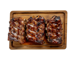 grilled spare ribs on wooden cutting board isolated on a transparent background, top view png