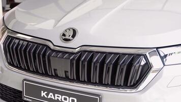 USA, NEW YORK, DEC 10, 2022. Detailed close up view of new Skoda. Auto showroom video