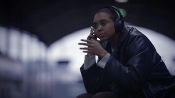 Young Stylish Woman Wearing Headphones Listening Music Commuting video