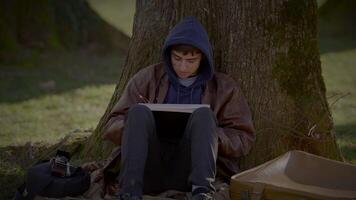 Young Creative Male Artist Drawing a Sketch Outside in the Park video