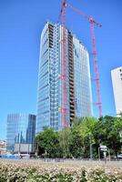 High-rise building under construction. Modern office building. photo