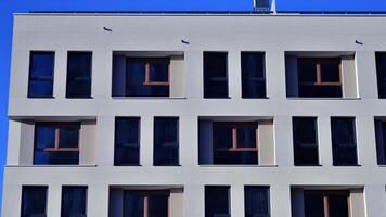 Residential area with modern apartment building. Facade of a modern apartment building. photo