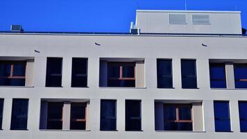 Residential area with modern apartment building. Facade of a modern apartment building. photo