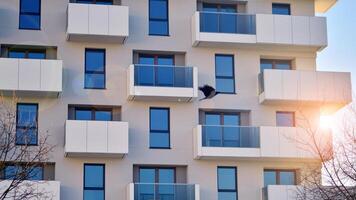 Residential area with modern apartment building. Facade of a modern apartment building. photo