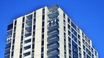 Residential area with modern apartment building. Facade of a modern apartment building. photo