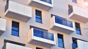 Residential area with modern apartment building. Facade of a modern apartment building. photo