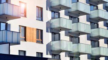 Residential area with modern apartment building. Multi Storey modern, new and stylish living block of flats. photo
