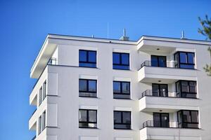 Residential area with modern apartment building. Multi Storey modern, new and stylish living block of flats. photo