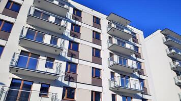 Residential area with modern apartment building. Multi Storey modern, new and stylish living block of flats. photo