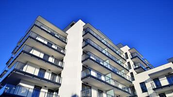 Residential area with modern apartment building. Multi Storey modern, new and stylish living block of flats. photo