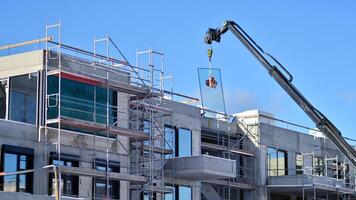 New multistory apartment buildings under construction photo