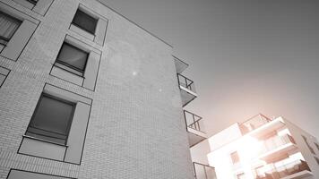 Fragment of the building's facade with windows and balconies. Modern apartment buildings on a sunny day. Facade of a modern residential building. Black and white. photo