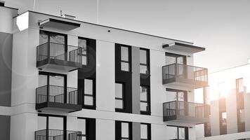 Fragment of the building's facade with windows and balconies. Modern apartment buildings on a sunny day. Facade of a modern residential building. Black and white. photo