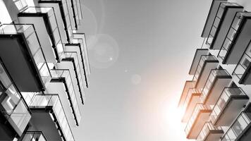 Fragment of a facade of a building with windows and balconies. Modern apartment buildings on a sunny day. Facade of a modern apartment building. Black and white. photo