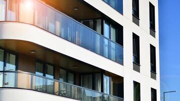 Modern architecture of urban residential apartment building. Apartment building exterior, residential house facade. photo