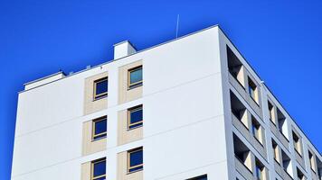 Modern architecture of urban residential apartment building. Apartment building exterior, residential house facade. photo